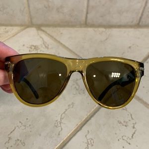 Electric transparent tan and black sunglasses